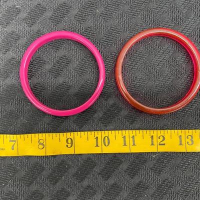 Pink and orange bracelets
