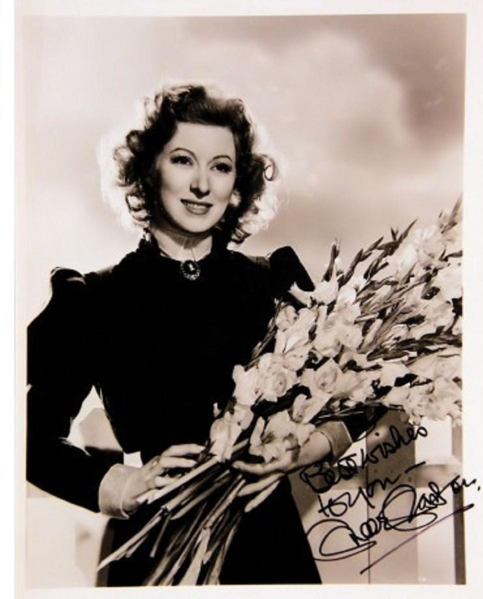 J. Garson Greer Garson signed portrait photo | EstateSales.org