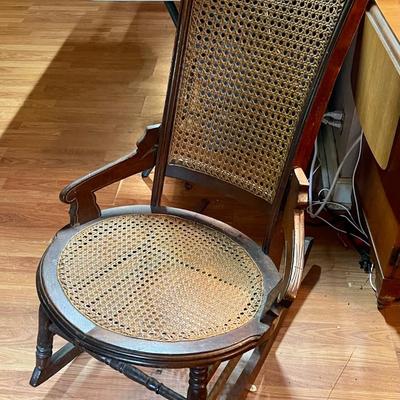 Antique cane back rocking chair