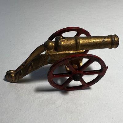 3 Red and Brass Cannons