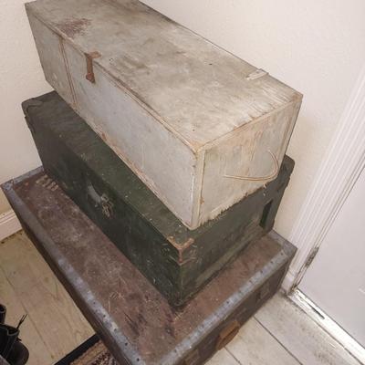 3 wooden trunks