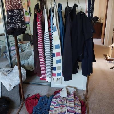 ROLLING CLOTHES RACK AND LADIES SWEATERS, TOPS AND SKIRT