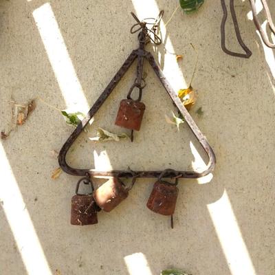 RUSTIC BELLS HUNG FROM VARIETY OF SHAPES AND HORSESHOES