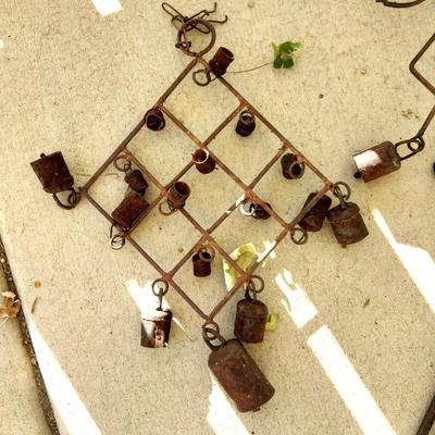 RUSTIC BELLS HUNG FROM VARIETY OF SHAPES AND HORSESHOES