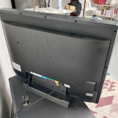 32"XIZIO WITH REMOTE AND GLASS FRONT STAND WITH STORAGE
