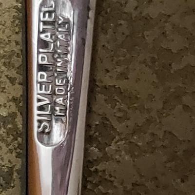 large silver plate spoon made in Italy