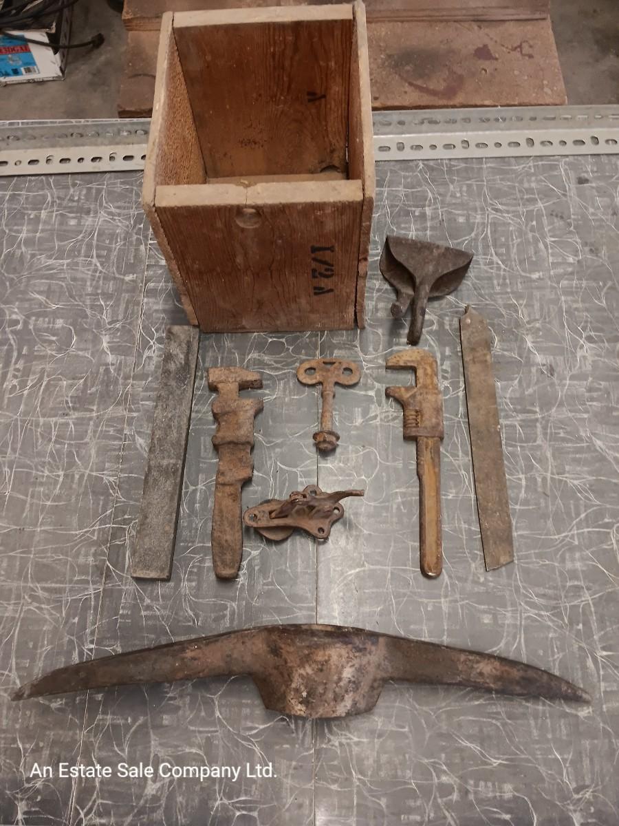 Wooden box with assortment of Antique rusty tools and hardware ...