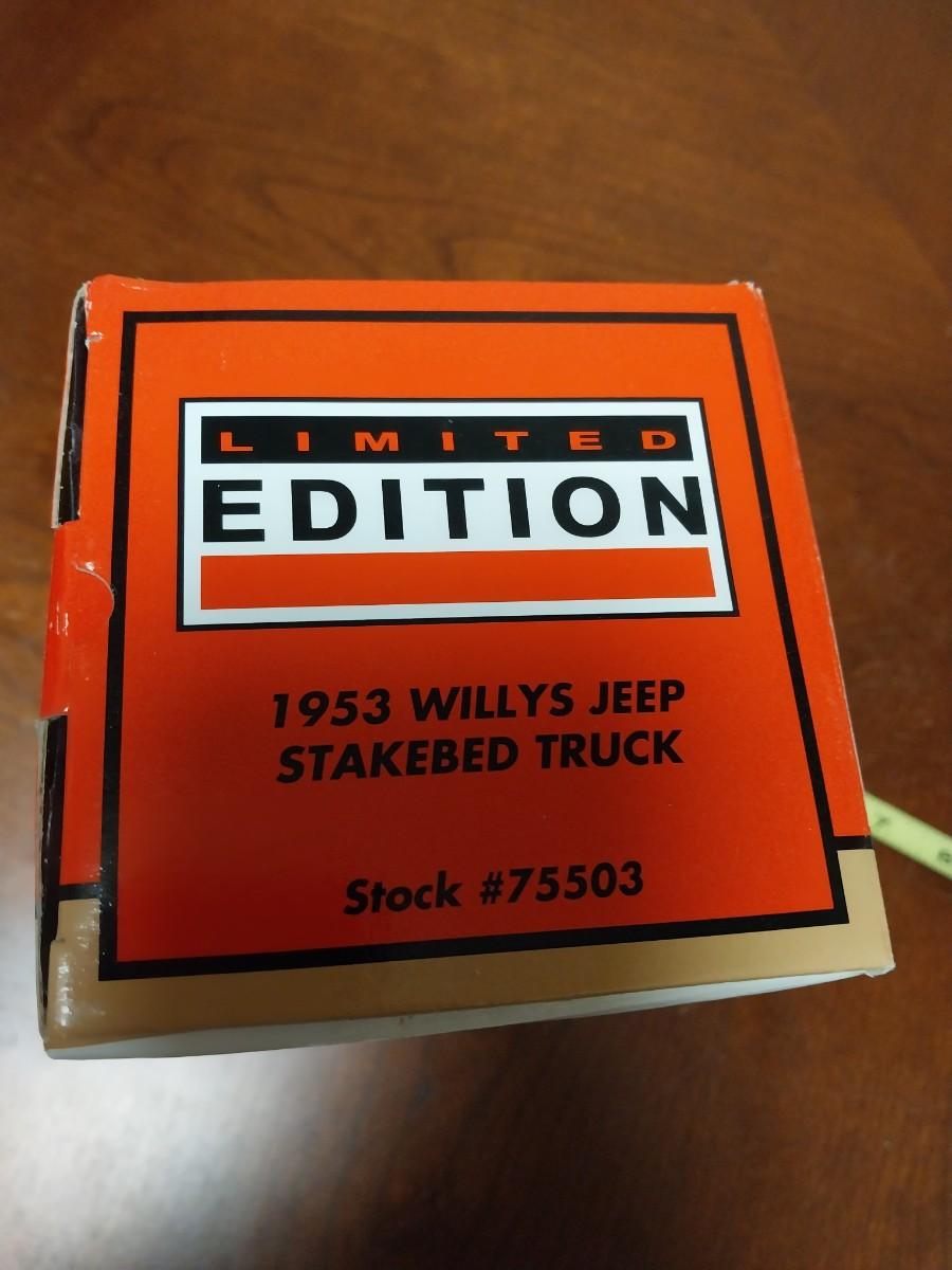 1953 WILLYS JEEP WITH STAKEBED DIE-CAST MODEL | EstateSales.org