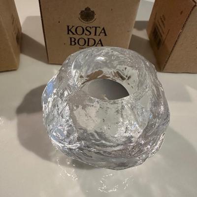 4 Kosta Boda hurricanes in box/brand new.