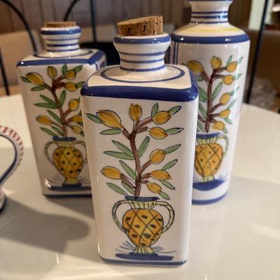 3 Italian looking canisters with cork tops