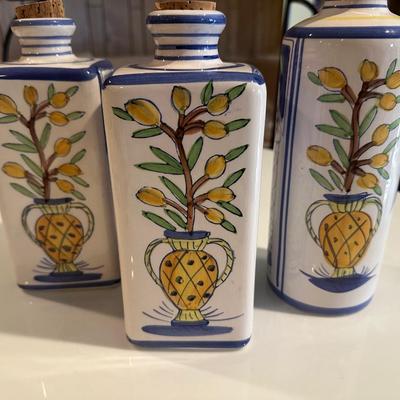 3 Italian looking canisters with cork tops