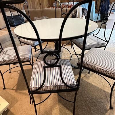 Polished white with tulip style medal pedestal and 6 metal and freshly upholstered chairs