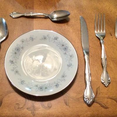 Pattern shots of china, stainless flatware