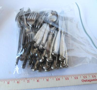 Set of Oneida Flatware Plus 4 Serving Pieces, Rattan