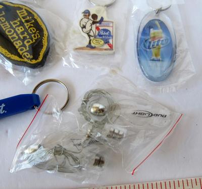 Lot of Small Advertising Key Rings and Ear Buds
