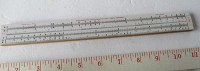 Old Gyroscope in Original Box and Vintage Plastic Face Slide Rule in Original Box