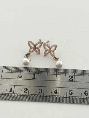 Rose gold tone butterfly earrings