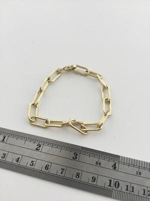 Gold tone chain link type fashion bracelet