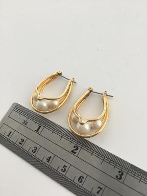 Gold tone fashion dangle earrings