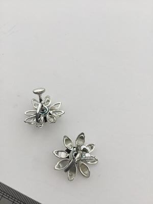 Screw on silver tone flower earrings