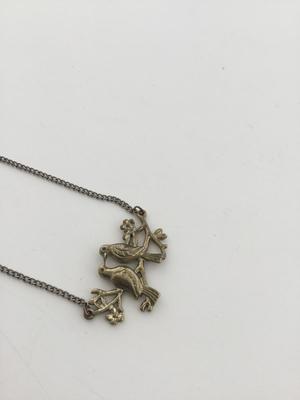 Claire’s gold tone bird necklace
