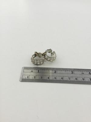 Unmarked silver tone clip on vintage earrings