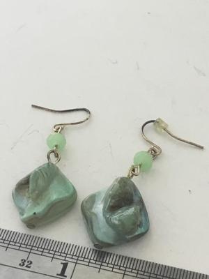 Green stone type dangle earrings