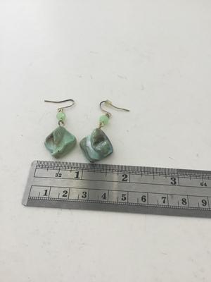 Green stone type dangle earrings