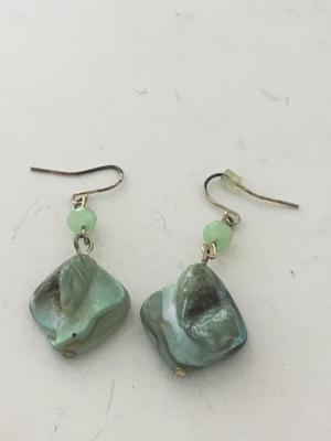 Green stone type dangle earrings