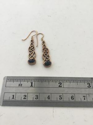 Gold tone dangle beautiful earrings