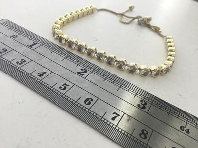 Gold tone rhinestone adjustable bracelet