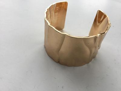 Gold tone fashion cuff