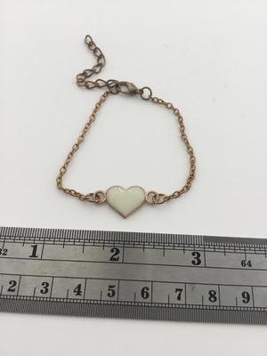 Gold tone adjustable heart bracelet