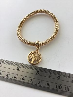 Gold tone mesh type tree of life