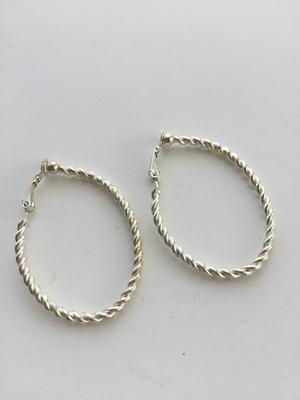 Beautiful silver tone loop faux earrings