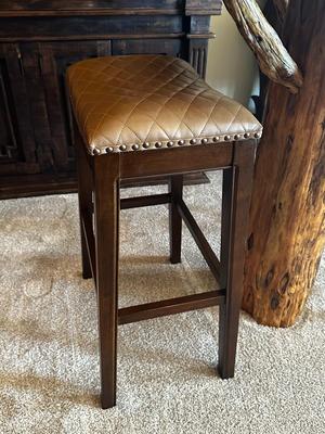 Pair of Solid Wood, Brown Quilted Saddle Bar Stools with Nail Head Trim