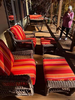 Wicker Porch Swivel Glider Chair with Ottoman and Orange Cushions #1