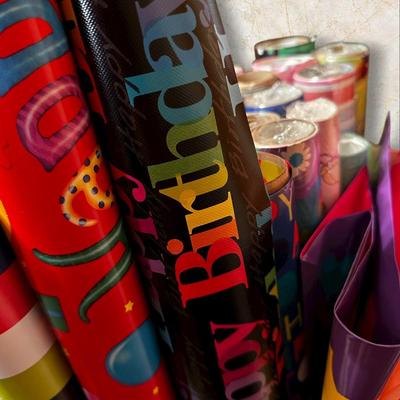 Tub Chock Full of Wrapping Paper Rolls