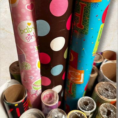 Tub Chock Full of Wrapping Paper Rolls