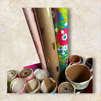 Tub Chock Full of Wrapping Paper Rolls