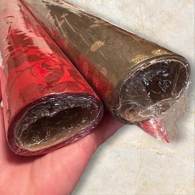 5 BIg Rolls of Christmas Wrapping Paper (4 Unopened)