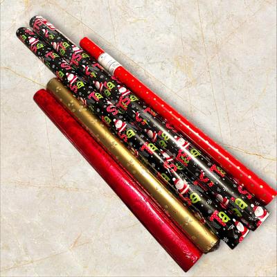 5 BIg Rolls of Christmas Wrapping Paper (4 Unopened)