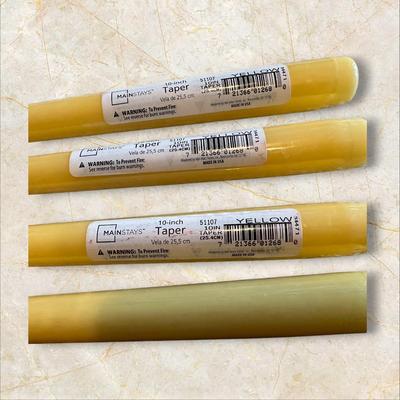 Lot of Pink, Maroon, and Yellow Taper Candles
