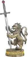 Harry Potter Gryffindor sword pen and stand set, featuring a pewter-finish lion figurine holding Godric Gryffindor's sword.