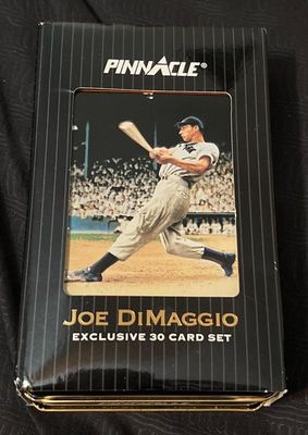 Pinnacle Joe DiMaggio Exclusive 30 Card Set in its original black and gold collector's tin, showcasing minor wear on the outer...