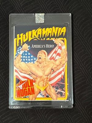 Vintage Hulk Hogan "Hulkamania America's Hero!" trading card, preserved in a protective hard plastic sleeve.