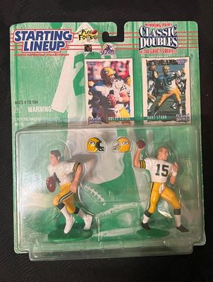 Vintage 1997 Kenner Starting Lineup Classic Doubles action figure set featuring Green Bay Packers quarterbacks Brett Favre and Bart...