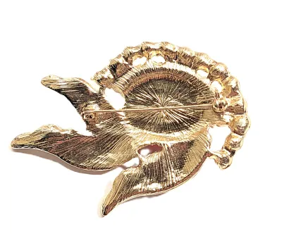 **NEW ARRIVAL** Bejeweled Gold Colored FLOWER SPRAY BROOCH (3" x 2") with Large Single Oval RED Center Stone on a Gold Tone...