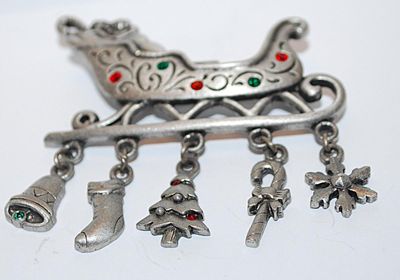Holiday Toy-Filled SLEIGH BROOCH (2¼" x 2¼") with Red and Green Stones & Bell, Stocking, Tree, Cane and Star Dangles on a...