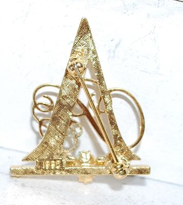 Gold Colored TRIANGLE BROOCH (1¼" x 1¼") with a Script Design and 4 Accent Stones on a Gold Tone Setting